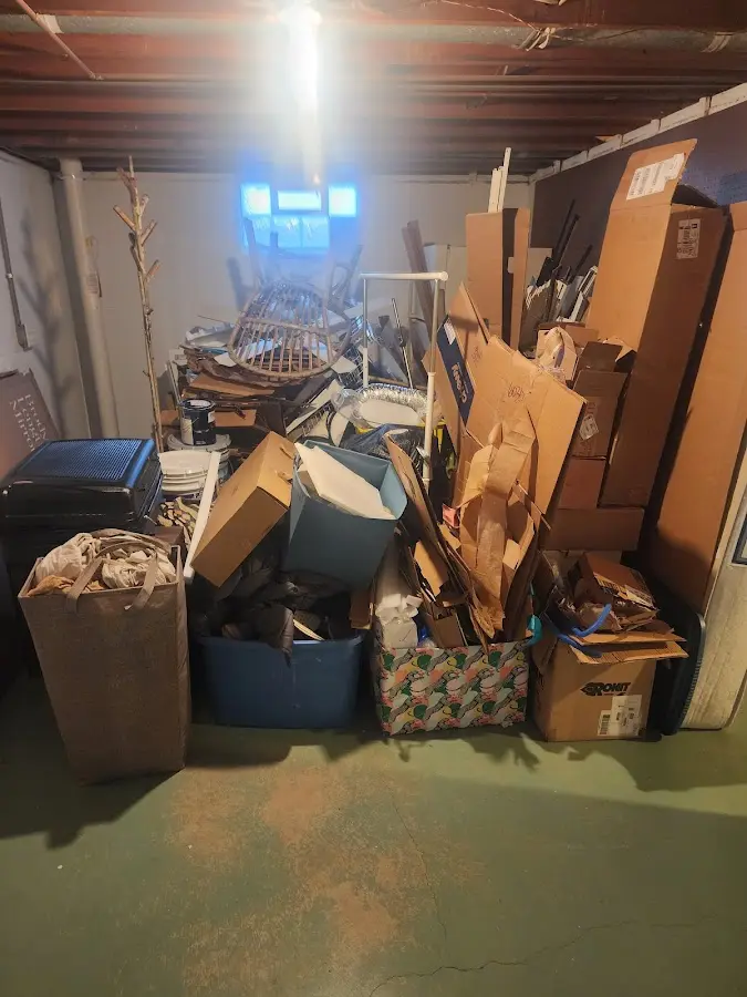 Roll-off dumpster container at job site for 6 Yard Dumpster Rental in Grand Junction